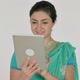 Indian Woman Using Tablet White Background - VideoHive Item for Sale