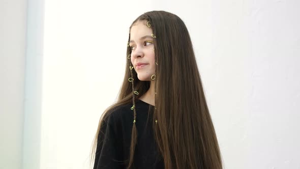 Portrait of a Beautiful Schoolgirl Girl with Long Straight Hair She Looks Away alt