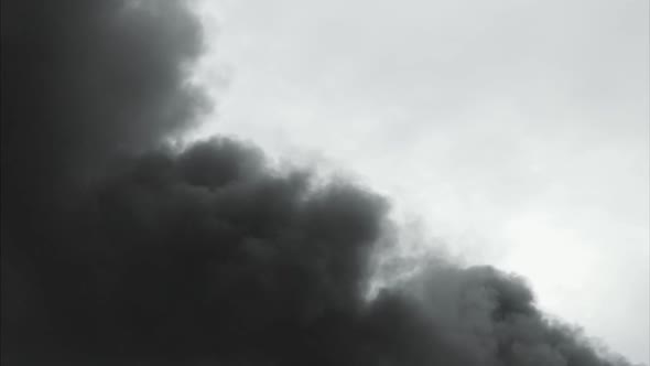 Black Clouds of Smoke Against Sky