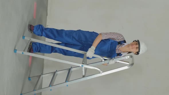Female with Ladder Prepares for Renovating House alt