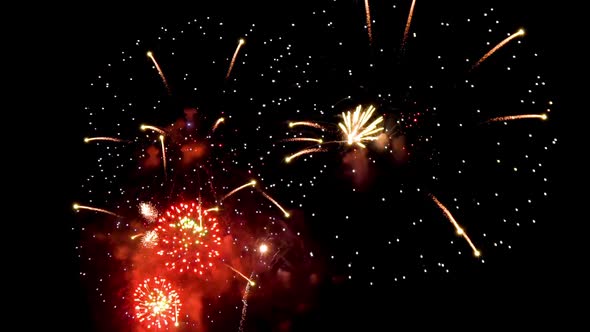 Colorful real fireworks show performance display celebration festival holiday on dark sky.