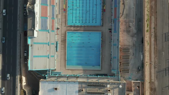 Swimming Pool with Swimmers Training Doing Lanes, Sunshine alt