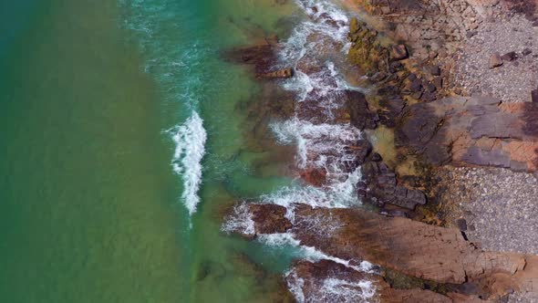 Aerial Drone View Of Waves Splashing On The Shore Of Noosa National Park In Queensland, Australia. alt