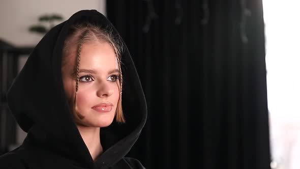 Attractive Young Woman with Nude Makeup Posing for Video alt