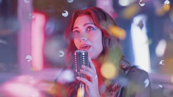 Portrait of a Young Female Singing in a Nightclub Party Closeup of a Woman's Face in Neon Light alt