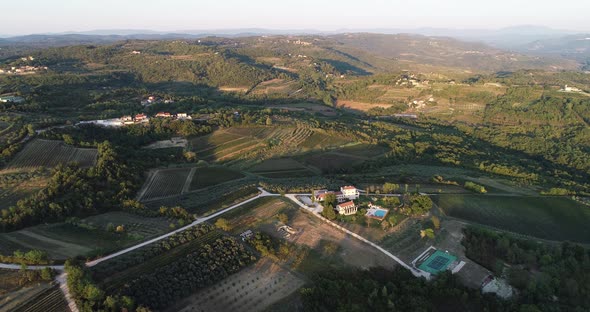 Aerial view of beautiful countryside at sunset with vineyard, Croatia. alt