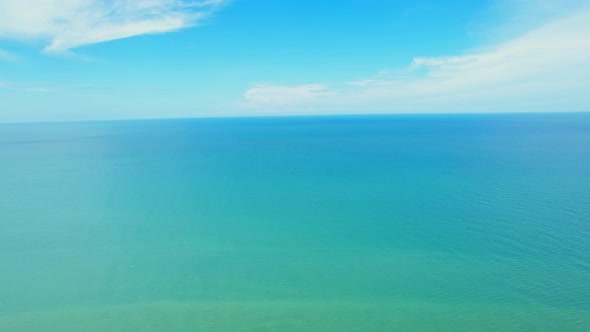 Aerial view over the sea, beautiful turquoise water alt
