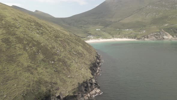 Beautiful Blue Waters And White Sand In A Cove In Achill Island - aerial shot alt