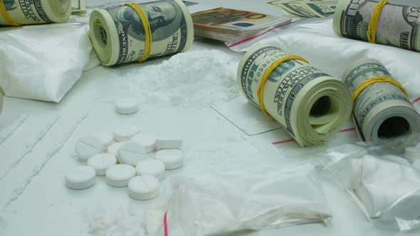 Illegal Dirty Profit Of The Drug Cartel From The Sale Of Cocaine And Tablets alt