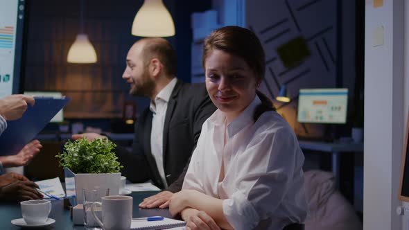 Portrait of Workaholic Businesswoman Looking Into Camera While Working in Company Office Meeting alt