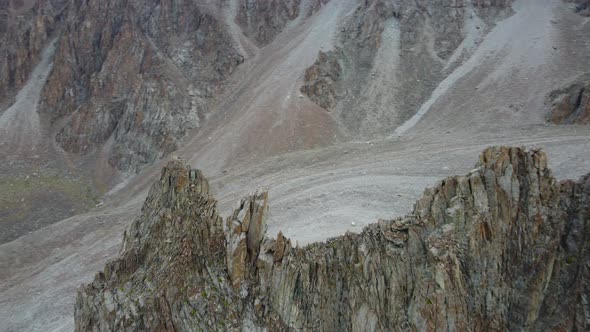 Fly over the rocks in mountains