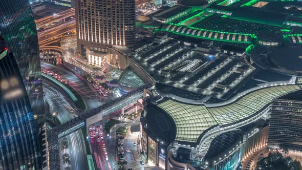 Dubai Downtown Street with Busy Traffic and Skyscrapers Around Timelapse alt