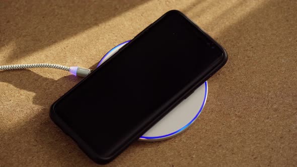 Someone Put Smartphone on Wireless Charger