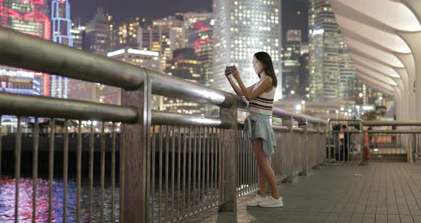 Woman visit Hong Kong and looking far away in Hong Kong alt