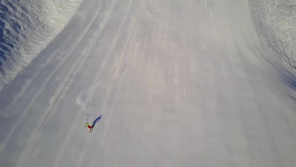 Aerial Skier on Freshly Prepared Ski Piste