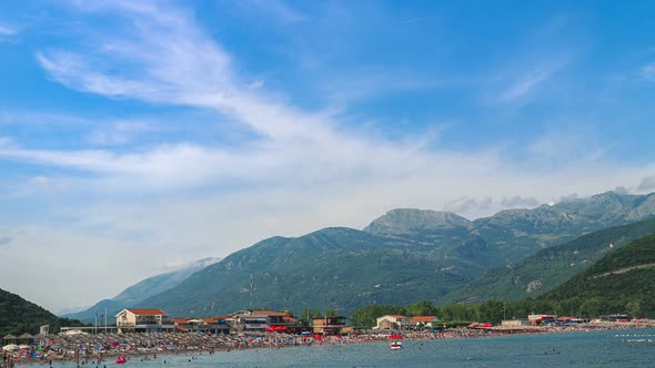 Jaz beach surrounded by mountains on the Adriatic sea coast, Montenegro. 4K time lapse