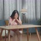 Drunk, Depressed Asian Woman Pouring Vodka In A Shot Glass Before Drinking And Crying At The Home - VideoHive Item for Sale