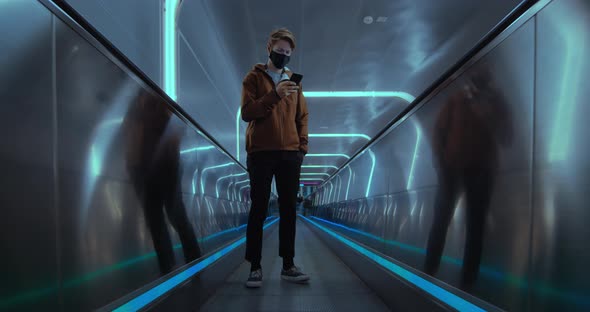 Modern Commuter on Subway in Urban City Use Phone alt