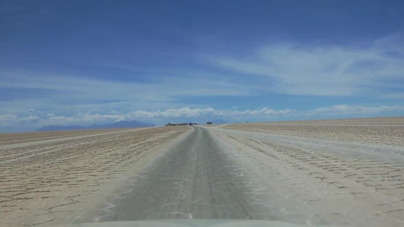 Car Going in the Dakar Rally Award Finish Place in Salar de Uyuni, Bolivia