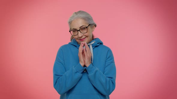 Sneaky Mature Grandmother Woman Thinking Over Devious Villain Idea Cunning Cheats Jokes and Pranks alt