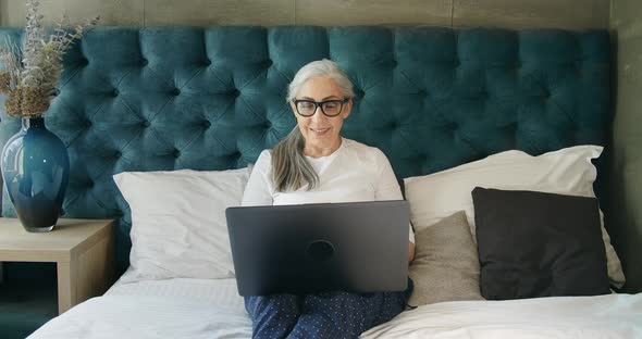 Elderly Woman Having Video Chat Laptop