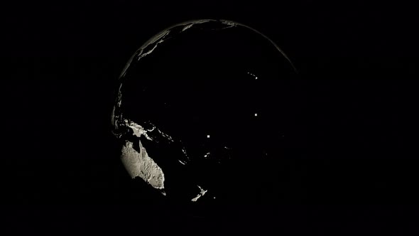 Black and White Planet Earth Rotates on Its Axis on Black Background alt