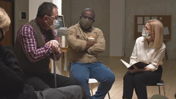 People Having Conversation during Group Therapy Session alt