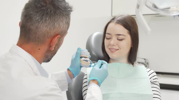 Attractive Female Patient Visiting Dentist