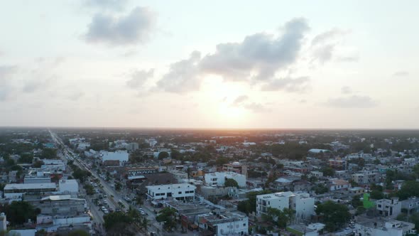Top Down View of Beautiful City of Tulum in Mexico with Houses and Vehicles Running on Road During alt