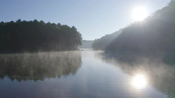 Fog or mist on lake with forest trees in Pang Ung reservoir, Mae Hong Son, Thailand alt