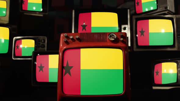 Flag of Guinea-Bissau and Stack of Old Television. alt