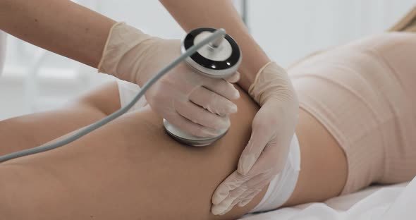 Hardware Figure Correction. Machine Cosmetology. Beautiful Woman Having Cavitation, Procedure alt