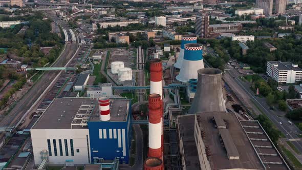 Aerial Drone Fly Over Shoot of White Red Tubes of Manufacturing Industrial Plant