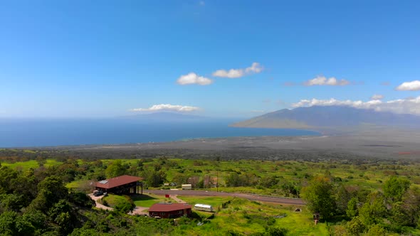 Beautiful 4k drone Maui upcountry near Keokea looking towards Maalaea Bay. February sky. alt