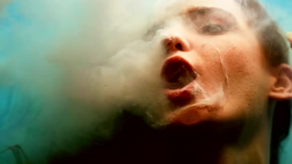 Closeup Portrait of a Woman Under Water in a Trance State Immersed As in Space Weightlessness White alt