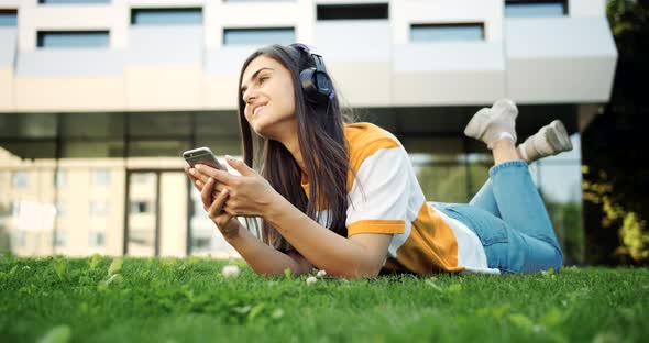 Hipster Woman Listening To Music in Headphones