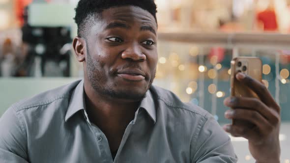 Happy Young Businessman Holding Smartphone Talking on Video Call Joyful Guy Communicates with Friend alt