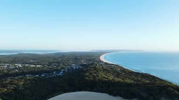 High drone view looking over the Carlo Sand Blow out towards Fraser Island Queensland Australia alt