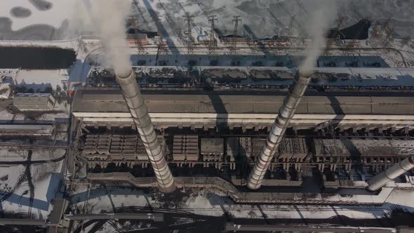 Aerial View of High Chimney Pipes with Grey Smoke From Coal Power Plant