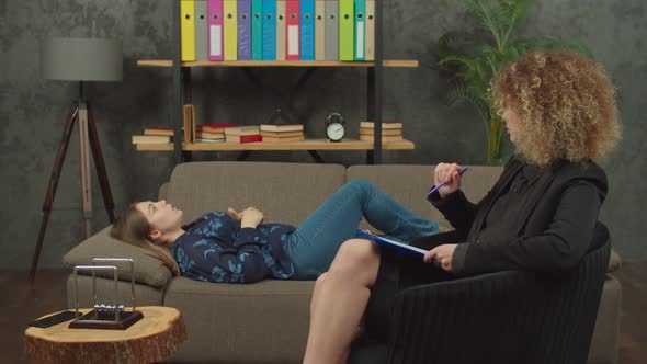 Depressed Female Telling About Mental Problems to Woman Psychotherapist alt