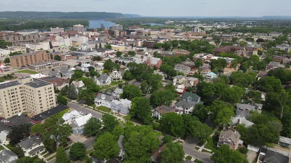 Amazing aerial view over midwest community with diverse buildings and Mississippi River seen.