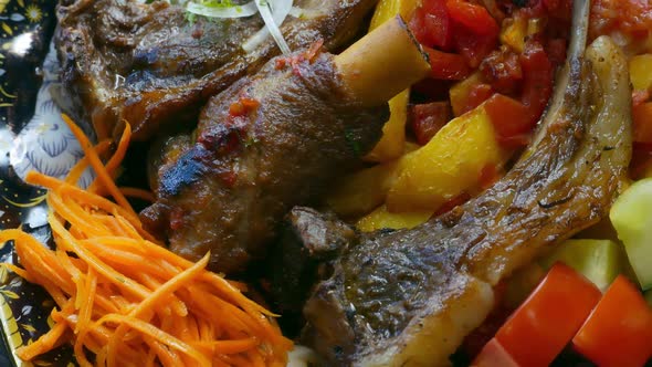 Bonein Beef Meat with Vegetables on a Plate