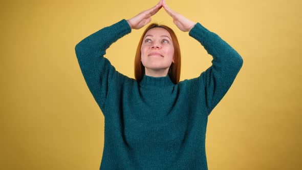 Young Red Hair Woman Posing Isolated on Yellow Color Background Studio alt