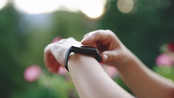 Smart Watch on Female Wrist Check Pulse on Fitness Bracelet Smartwatch