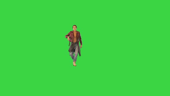 Stylish Girl Walking on Camera and Dancing on a Green Screen Chroma Key alt