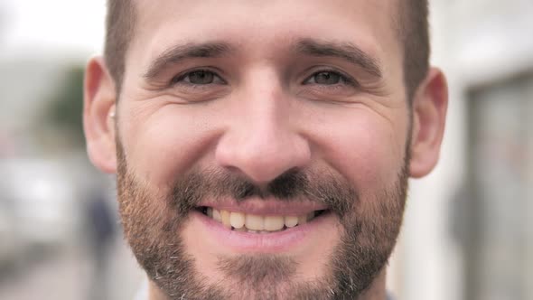Close up of Smiling Man Face alt