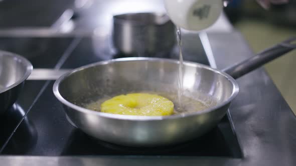 Closeup Unrecognizable Cook Pouring Water in Pan Frying Pineapple in ...