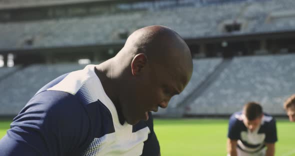 Male Rugby Player Disappointed After Losing Match in Stadium alt