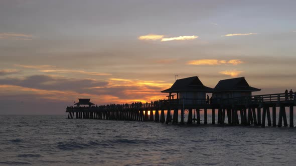 Dark Silhouette of a Sea Pier During Sunset.