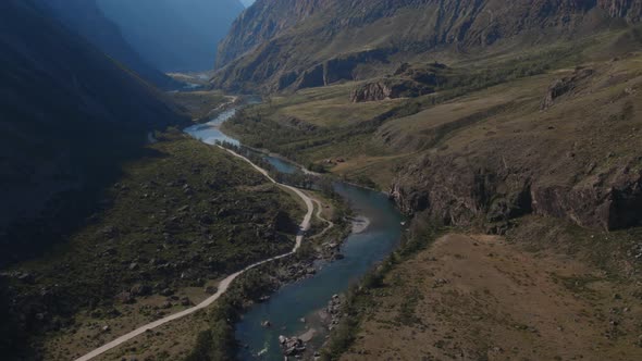 Valley Chulyshman with river and and mountains with blue clear sky in Altai